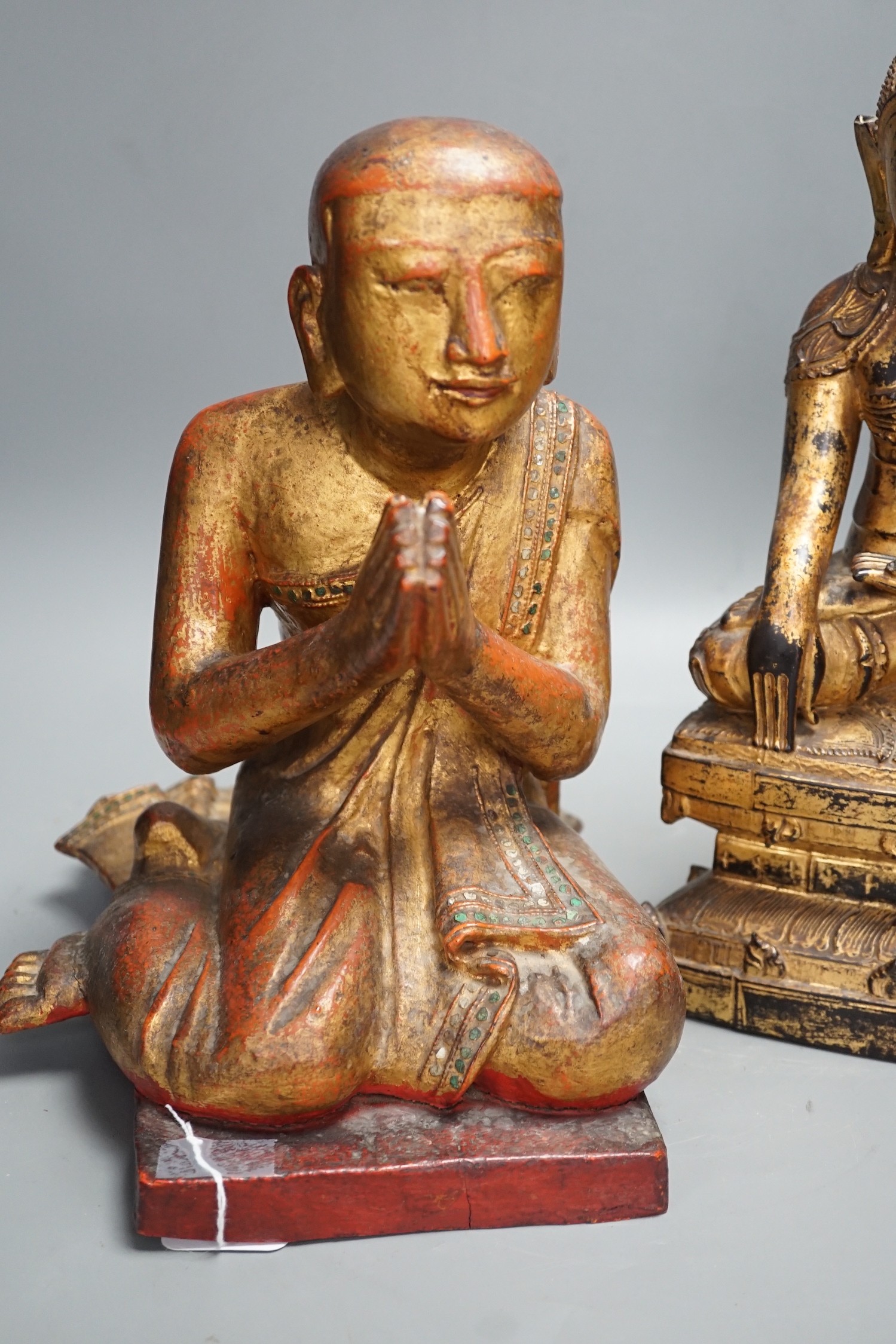 Two Thai gilt wood figures of Buddha, tallest 41cms high